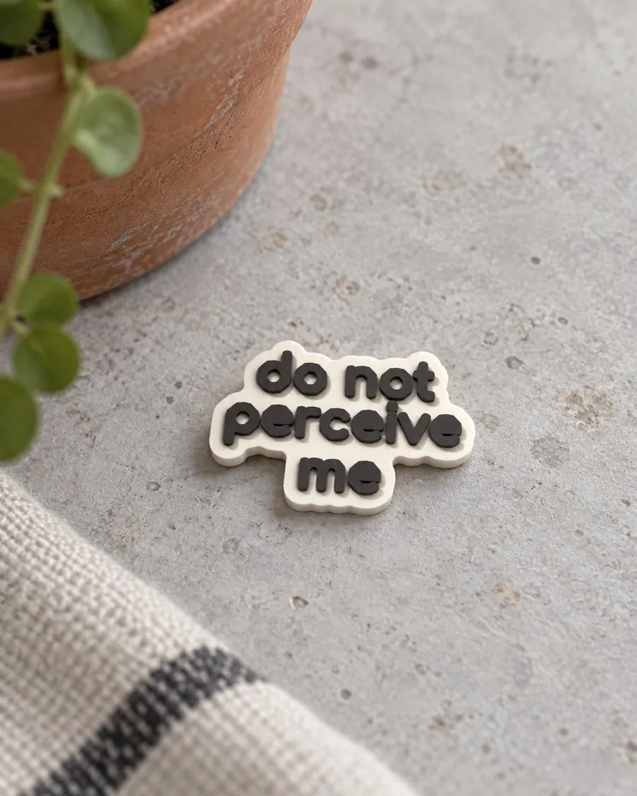 Bedž „Do Not Perceive Me“